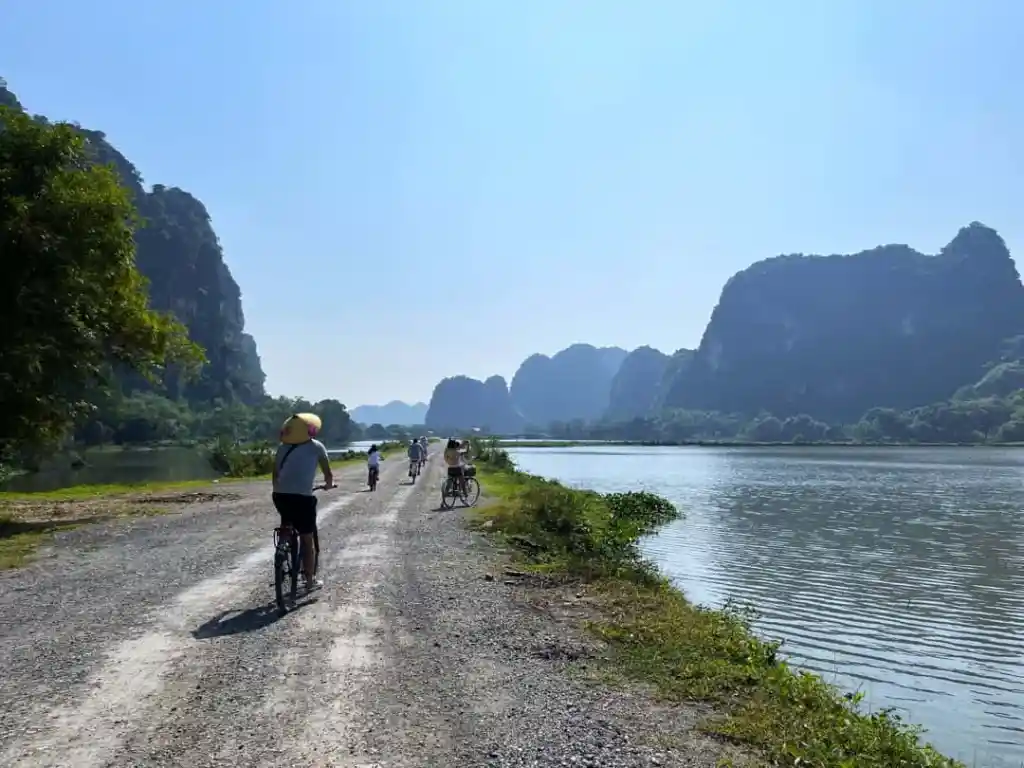 Kingdom of the Stone Giants: Ninh Binh Cycling Tour: Ride Through Majestic UNESCO Karst Valleys