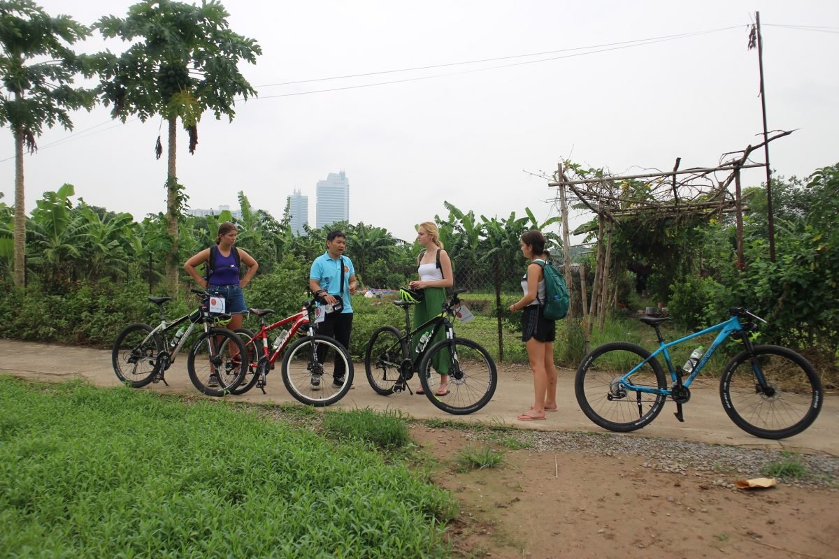 Hanoi Red River Sunset E-Bike Tour: Peaceful Escape